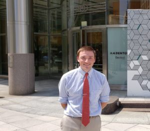 Nick Rogers in front of Denton's Washington office